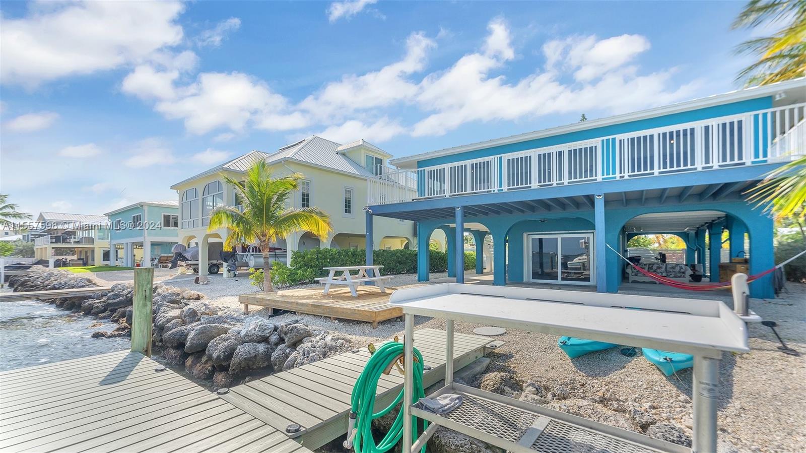 441 La Fitte Road Summerland Key, FL 33042 - Photo 19 of 81 a view of a house with pool and sitting area