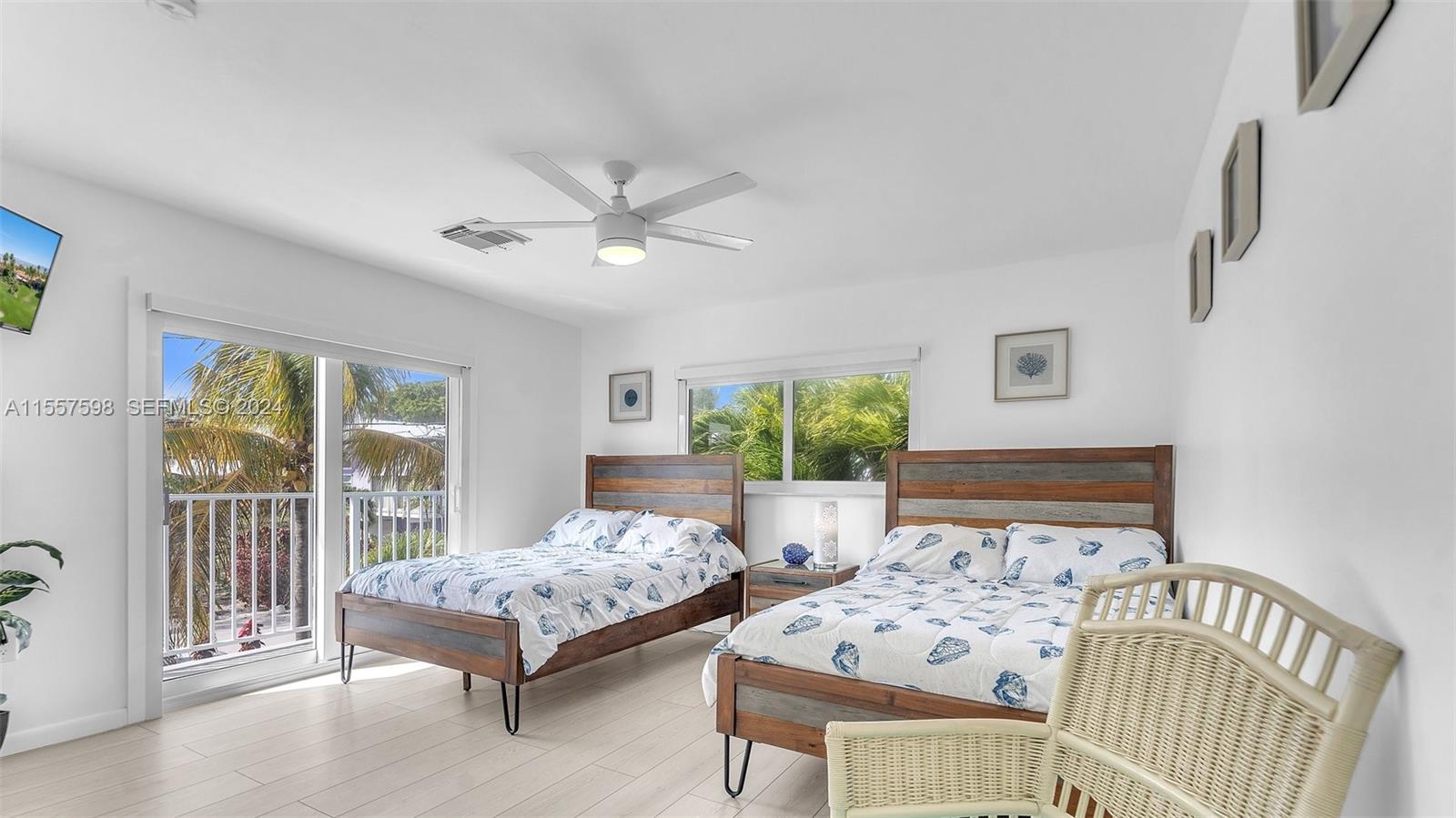 441 La Fitte Road Summerland Key, FL 33042 - Photo 22 of 81 a bedroom with furniture and a window