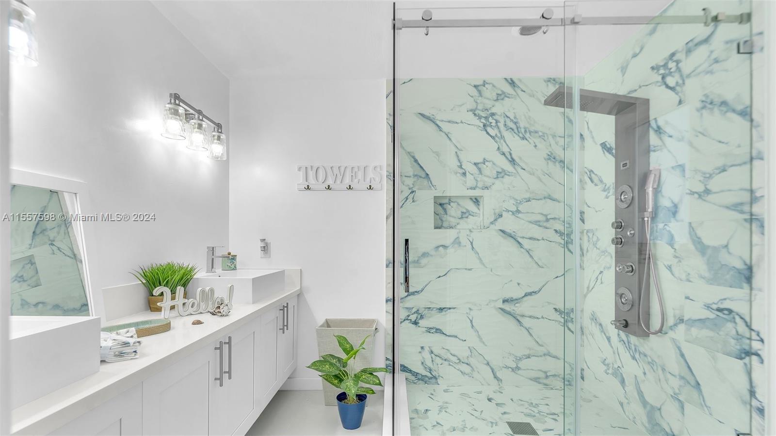 441 La Fitte Road Summerland Key, FL 33042 - Photo 36 of 81 a bathroom with a sink and a bathtub