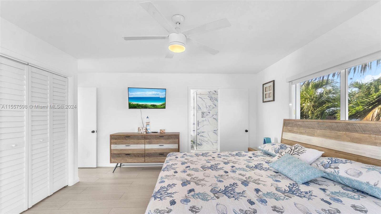 441 La Fitte Road Summerland Key, FL 33042 - Photo 40 of 81 a bedroom with a bed and a window