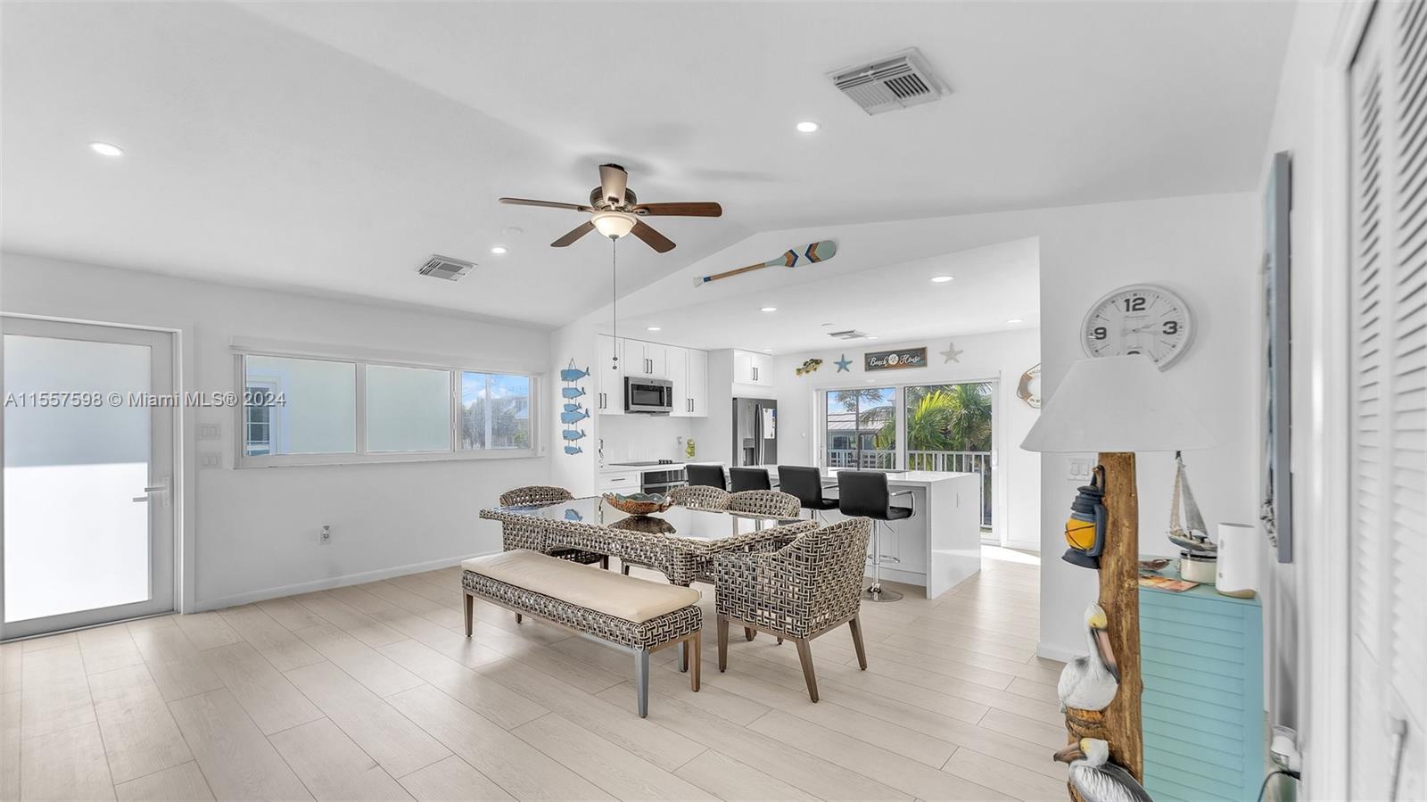 441 La Fitte Road Summerland Key, FL 33042 - Photo 43 of 81 a living room with furniture a rug and white walls
