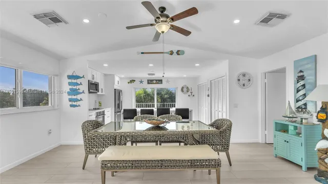 a view of a balcony with wooden floor