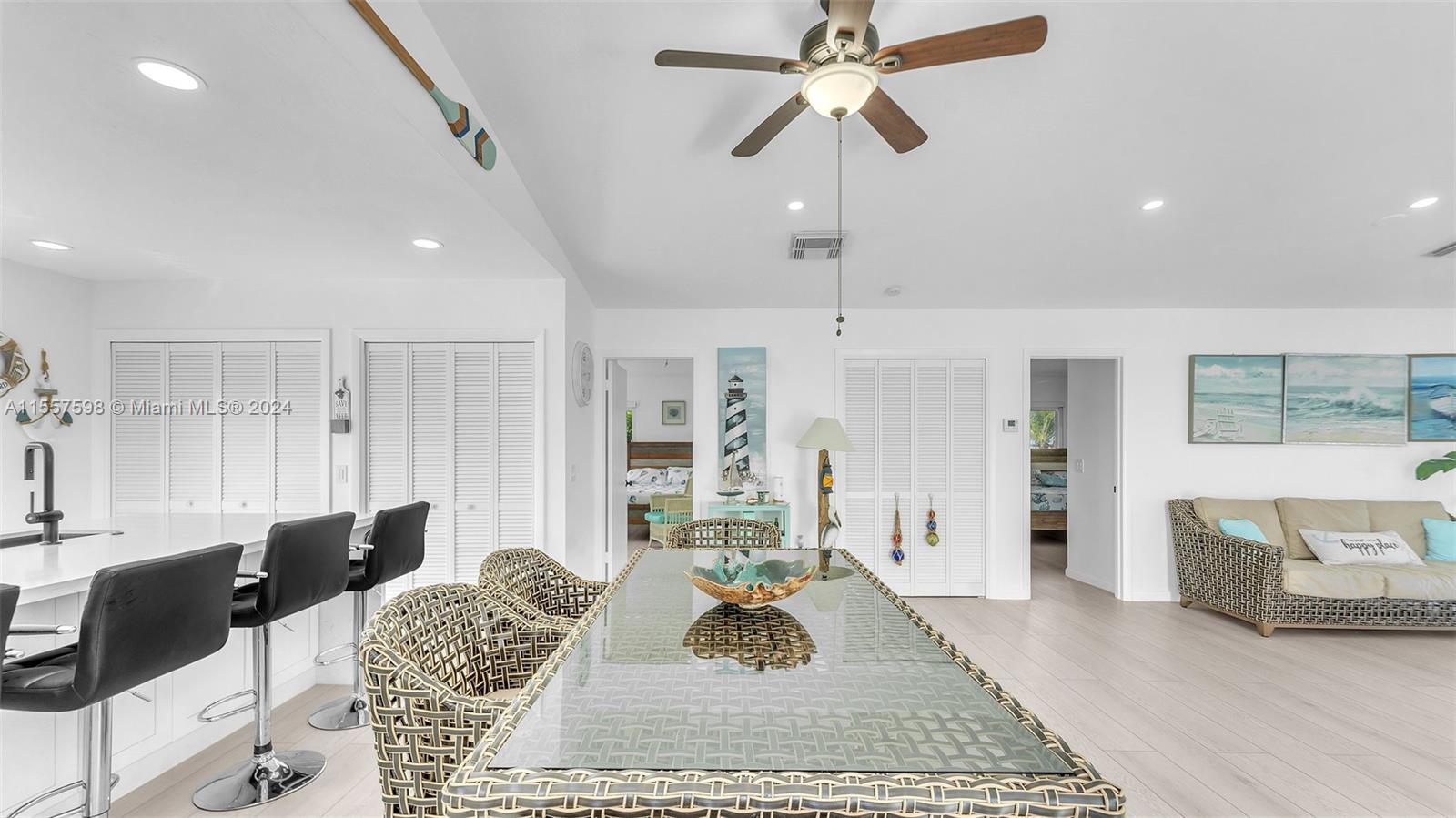 441 La Fitte Road Summerland Key, FL 33042 - Photo 51 of 81 a living room with furniture and a chandelier