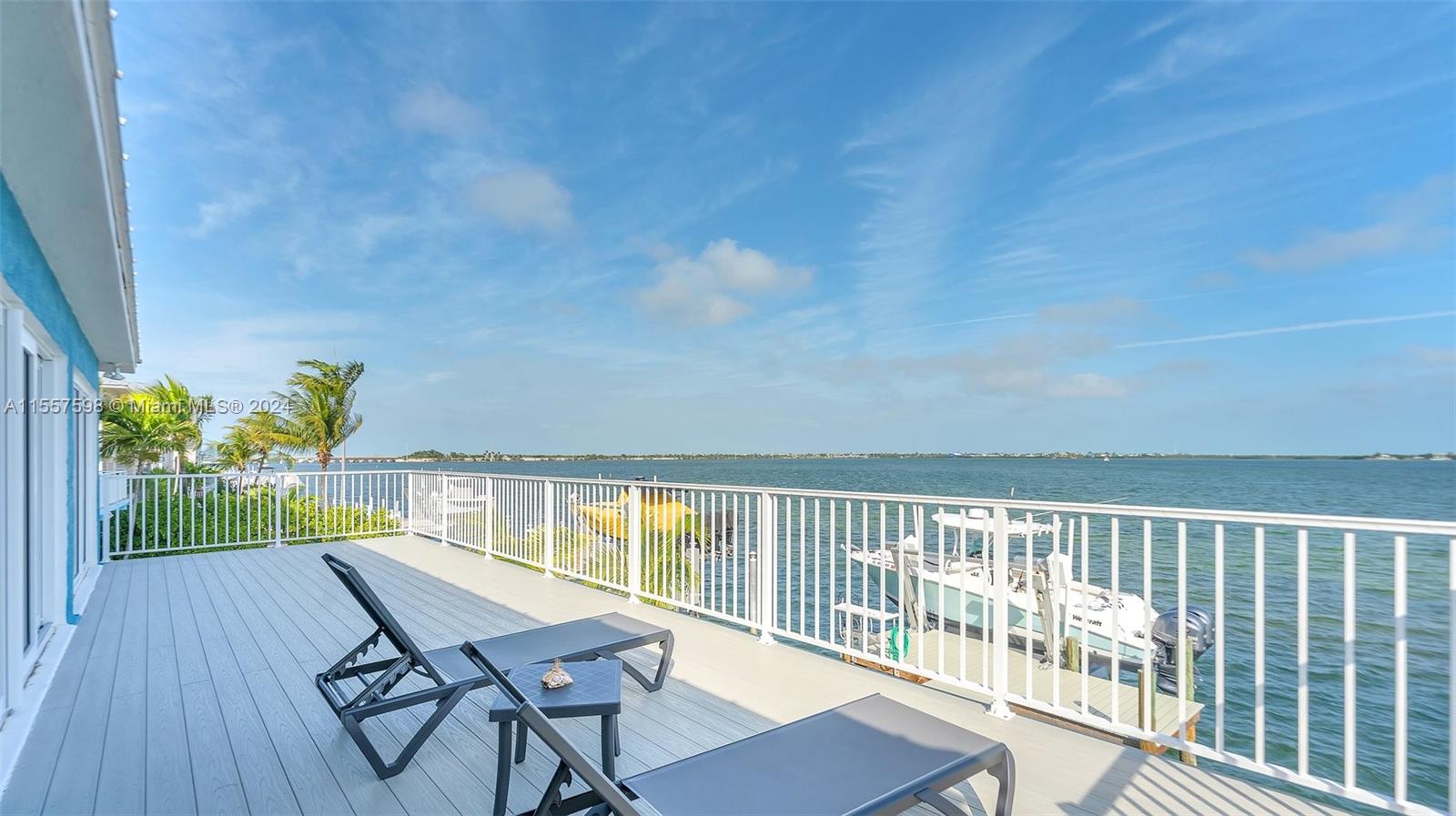 441 La Fitte Road Summerland Key, FL 33042 - Photo 63 of 81 a view of a balcony with wooden floor