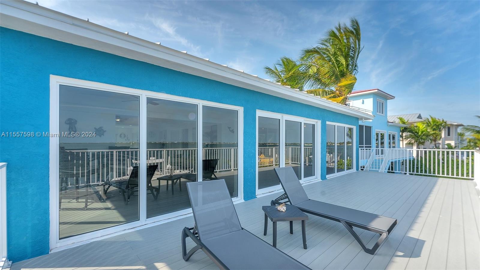 441 La Fitte Road Summerland Key, FL 33042 - Photo 64 of 81 a view of a patio with a table and chairs