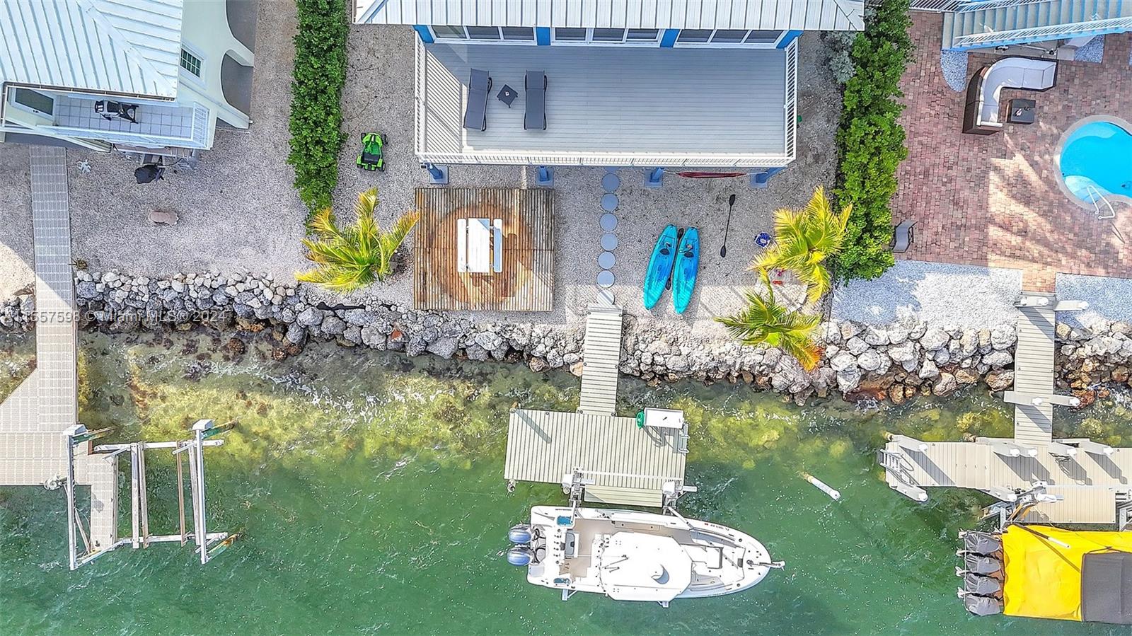 441 La Fitte Road Summerland Key, FL 33042 - Photo 72 of 81 a aerial view of a house with swimming pool garden and patio