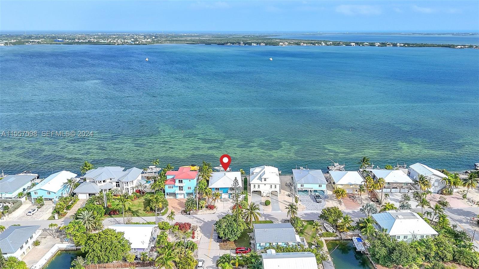 441 La Fitte Road Summerland Key, FL 33042 - Photo 75 of 81 a view of a lake with a mountain in the background