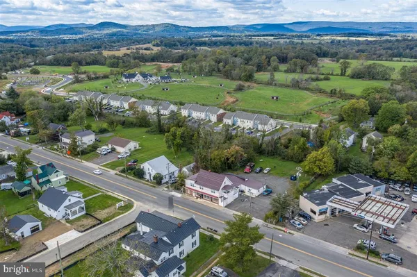 an aerial view of a city with houses