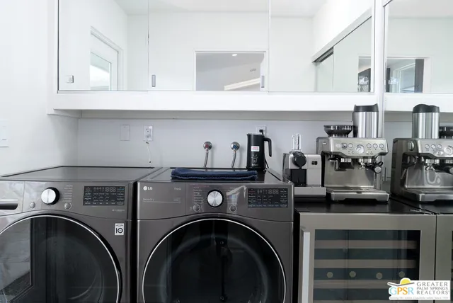 a view of washer and dryer in a utility room