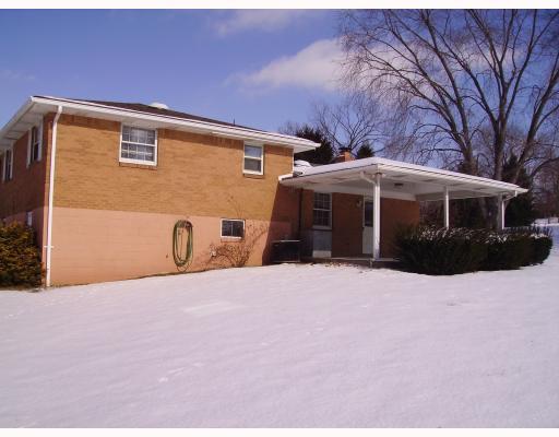 1128 Apples Mill Road West Newton, PA 15089 - Photo 15 of 16 Exterior Back. Back yard is level access to the covered porch.