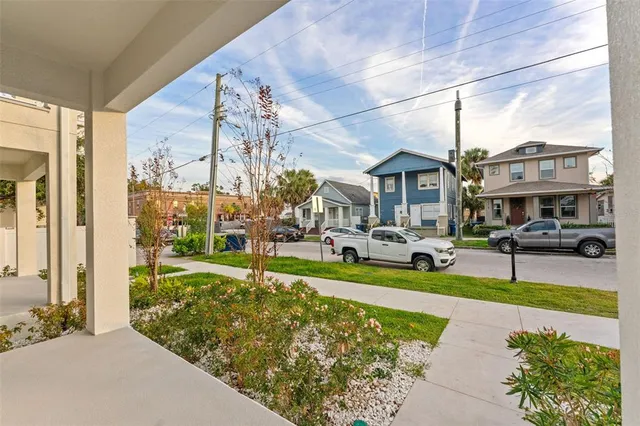 a front view of a building with garden