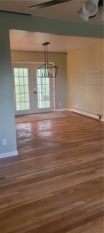 198 Little Summit Road Dunbar, PA 15431 - Photo 16 of 30 a view of empty room with wooden floor and fan