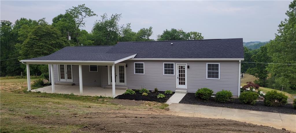 198 Little Summit Road Dunbar, PA 15431 - Photo 2 of 30 front view of a house with a yard