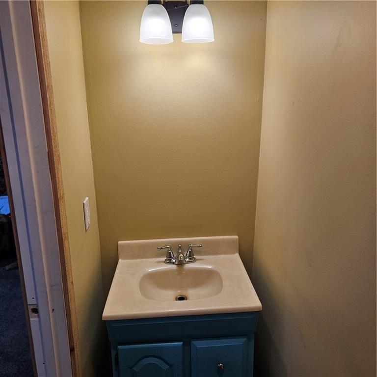 198 Little Summit Road Dunbar, PA 15431 - Photo 27 of 30 a bathroom with a sink and a mirror
