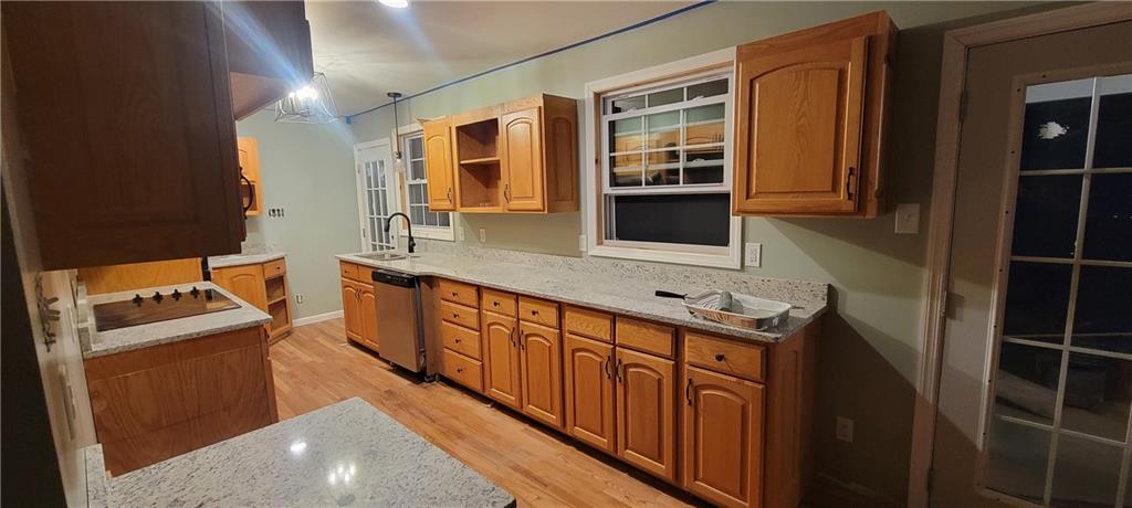 198 Little Summit Road Dunbar, PA 15431 - Photo 7 of 30 a kitchen with stainless steel appliances a sink and a refrigerator