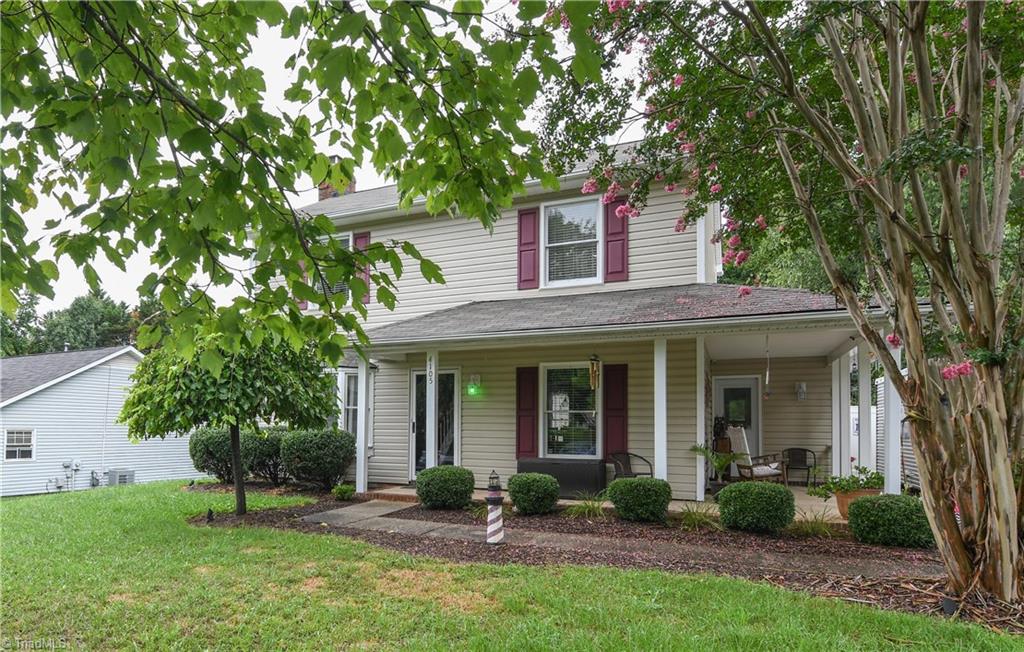4105 Appleton Road Greensboro, NC 27405 - Photo 2 of 30 Perennials and sweet boxwoods surround your front and side porch which are great for morning coffee and relaxing!