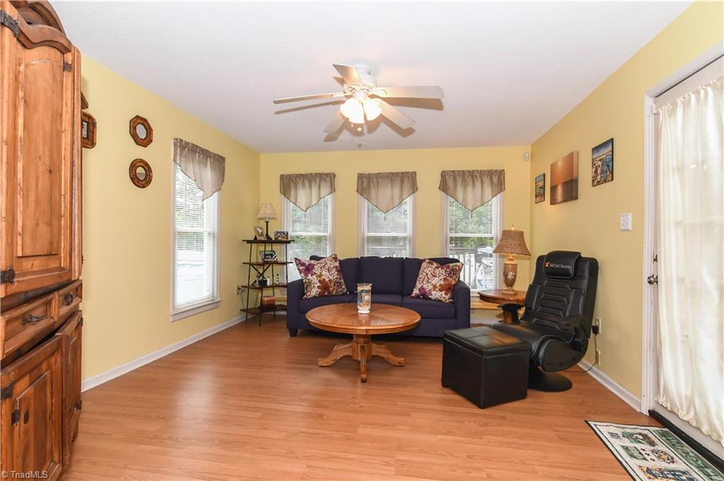 4105 Appleton Road Greensboro, NC 27405 - Photo 14 of 30 Large bonus room offers a den, office, or many kinds of uses with access to the back yard.
