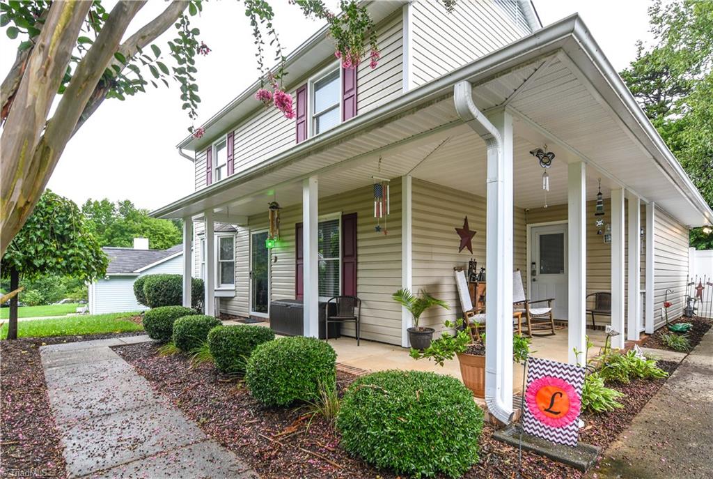4105 Appleton Road Greensboro, NC 27405 - Photo 3 of 30 Awesome sitting porch is one of the first things you see on this great home.
