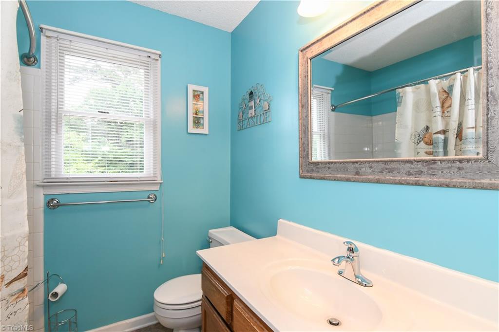 4105 Appleton Road Greensboro, NC 27405 - Photo 21 of 30 Sunny blue guest/hall bath is perfectly located for the other upstairs bedrooms.