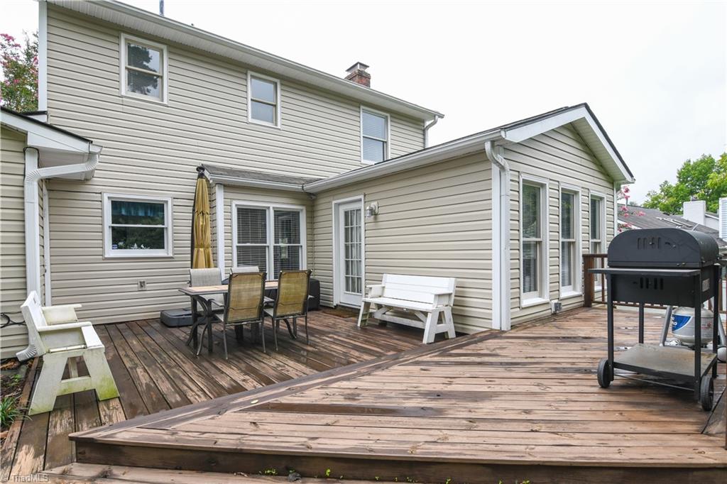 4105 Appleton Road Greensboro, NC 27405 - Photo 25 of 30 Deck with dining area and cooking area is great for summer cookouts!