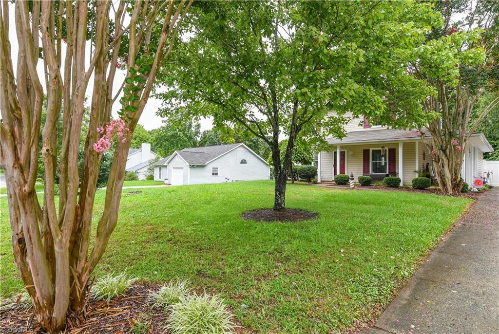 4105 Appleton Road Greensboro, NC 27405 - Photo 28 of 30 Street view---home has long drive and nice parking area.