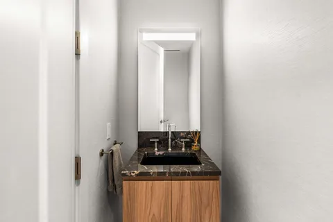 a view of a hallway with washer and dryer