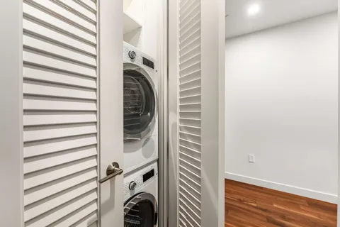 a view of a dining room with furniture and window