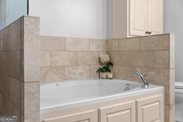 a bathroom with a sink and vanity