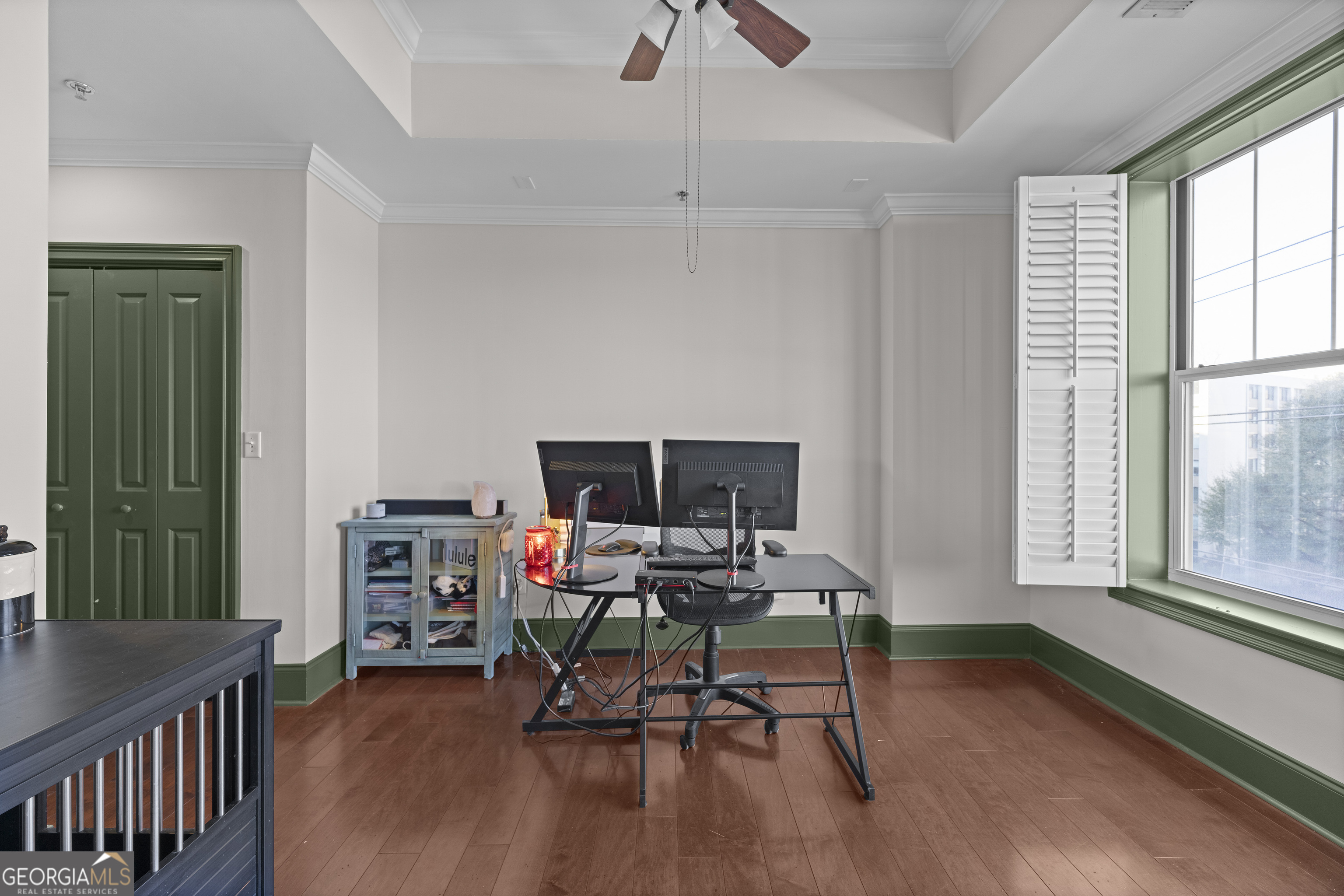 2255 Peachtree Road Northeast, Unit 521 Atlanta, GA 30305 - Photo 27 of 51 a workspace with wooden floor and a window