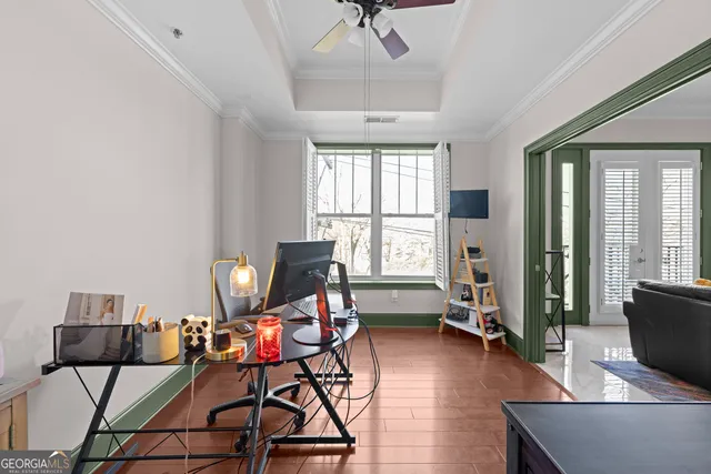 a living room with furniture and a window