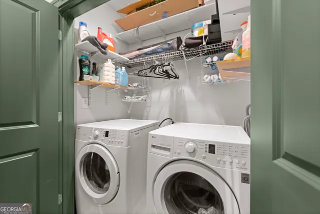a utility room with dryer and washer