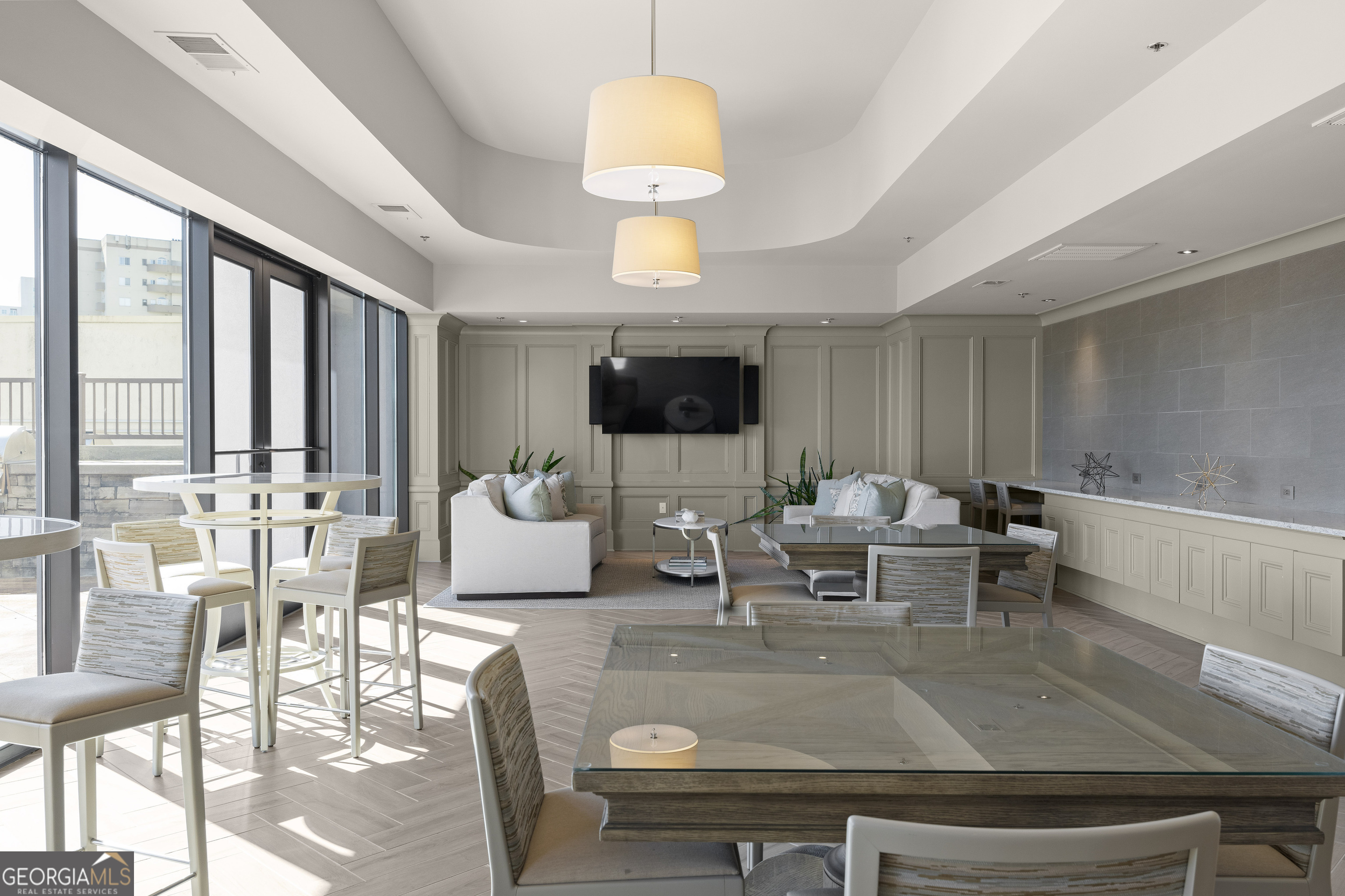 2255 Peachtree Road Northeast, Unit 521 Atlanta, GA 30305 - Photo 38 of 51 a living room with furniture and a flat screen tv