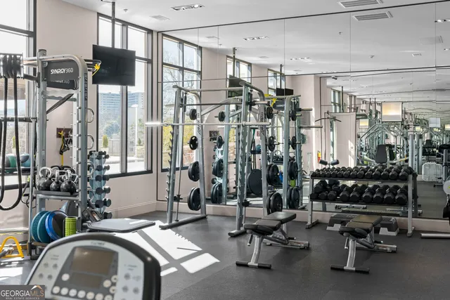 a view of a livingroom with furniture and window