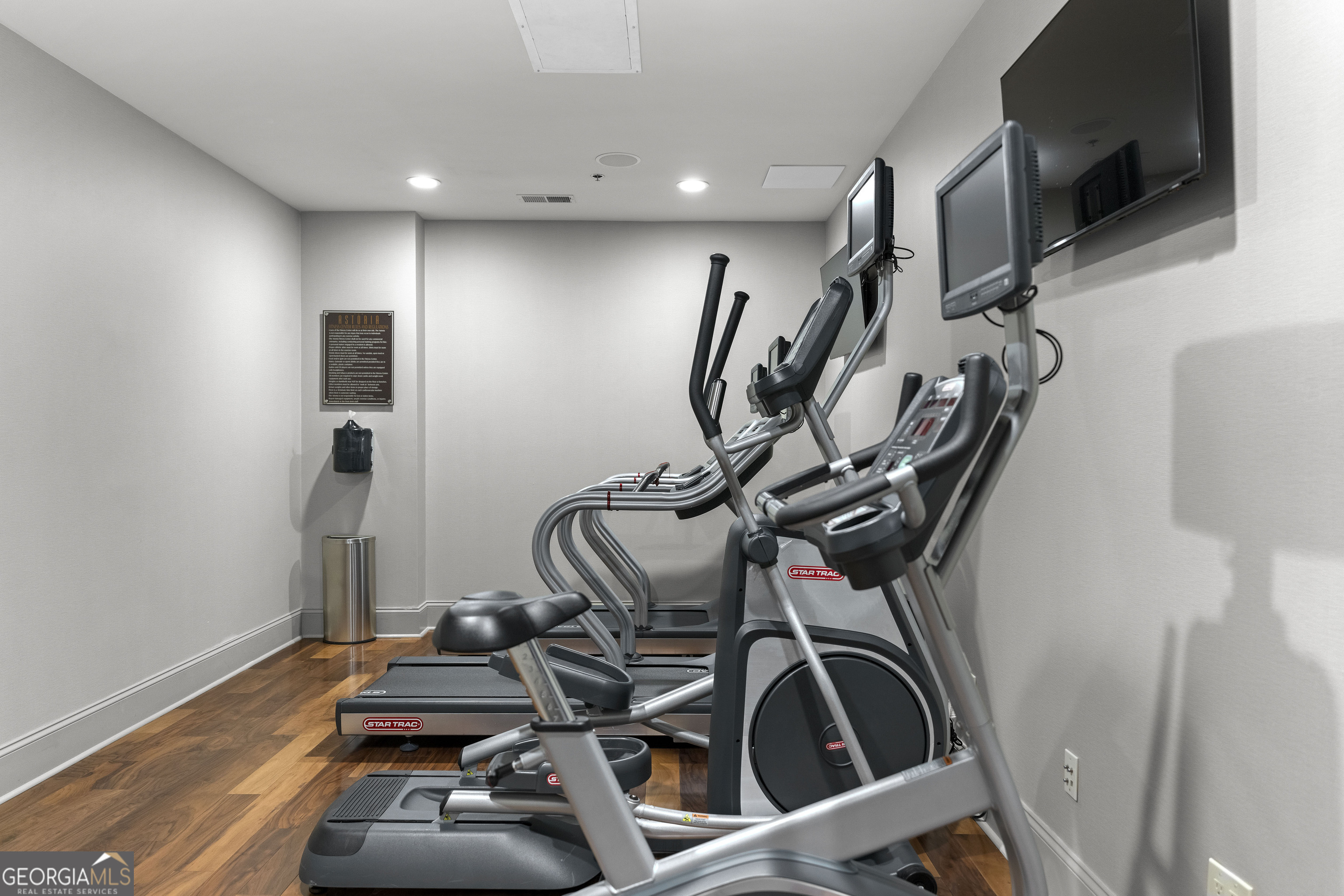 2255 Peachtree Road Northeast, Unit 521 Atlanta, GA 30305 - Photo 44 of 51 a view of a room with gym equipment