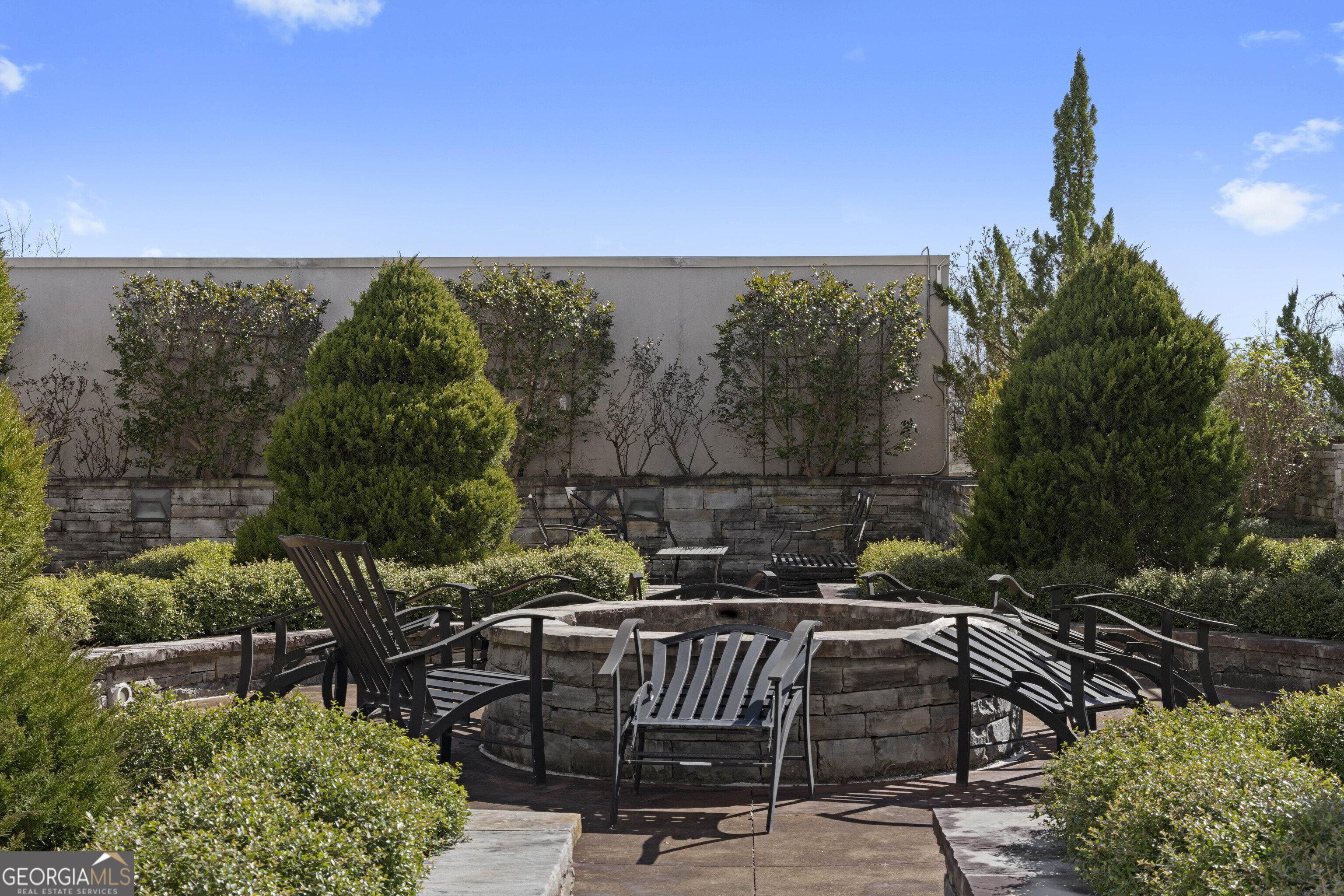 2255 Peachtree Road Northeast, Unit 521 Atlanta, GA 30305 - Photo 46 of 51 a view of swimming pool with outdoor seating and plants