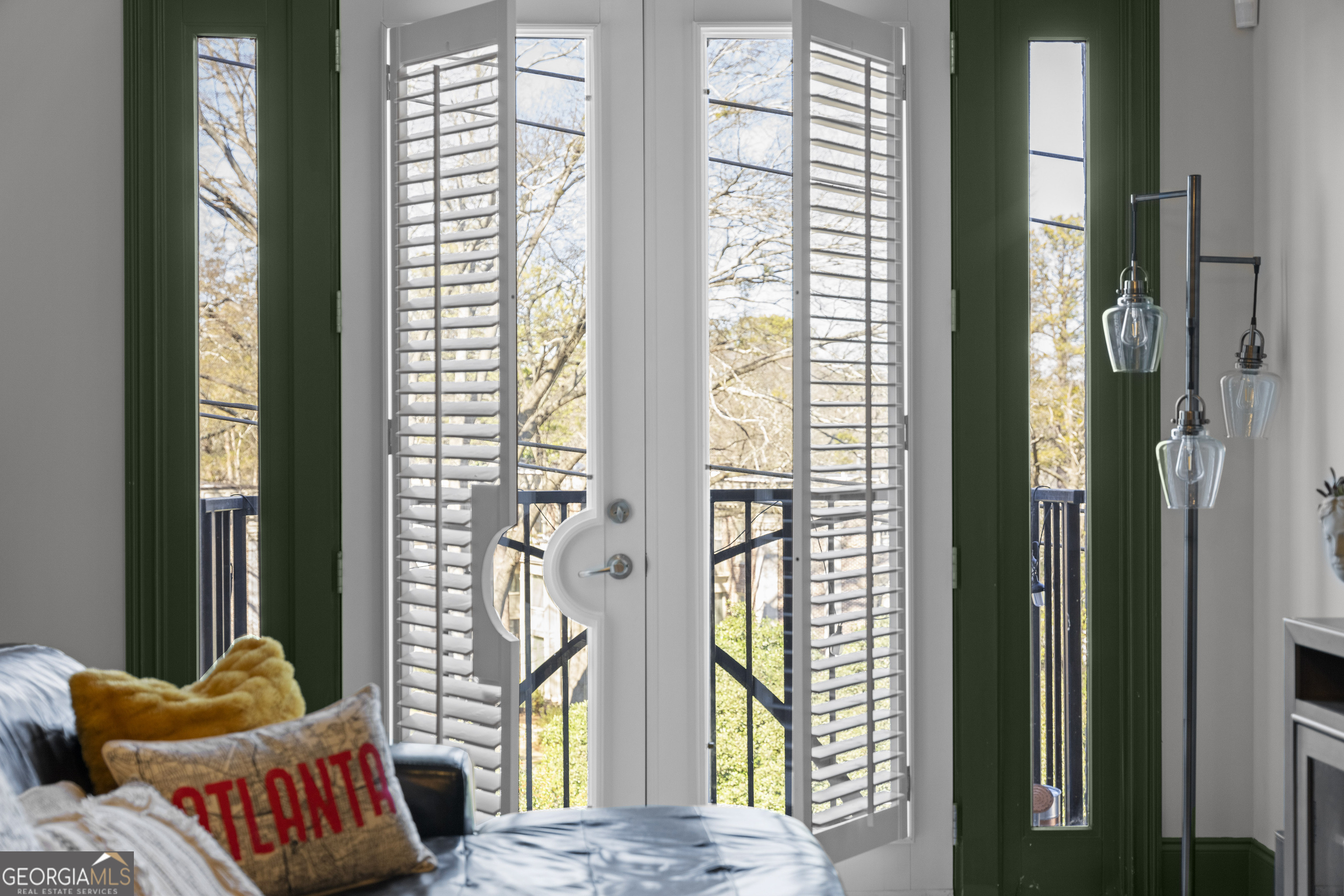 2255 Peachtree Road Northeast, Unit 521 Atlanta, GA 30305 - Photo 10 of 51 a bedroom with a bed and a window