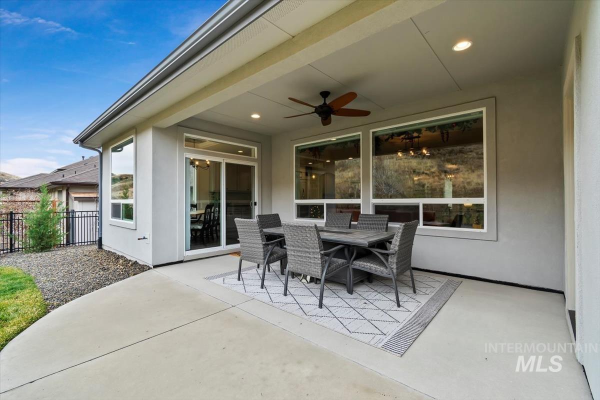 20530 North Shepherds Pie Way Boise, ID 83714 - Photo 33 of 47 View of patio featuring outdoor dining area and a ceiling fan