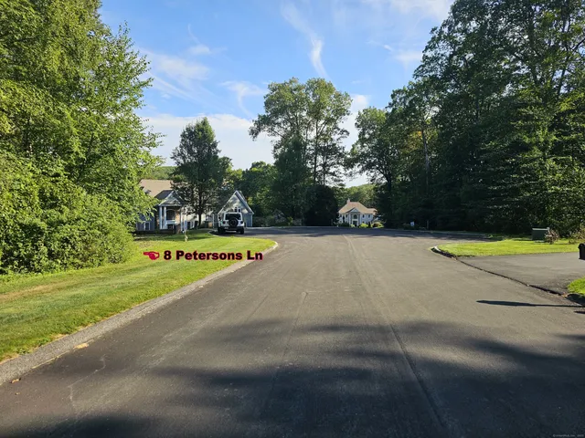 a view of a swimming pool and a yard