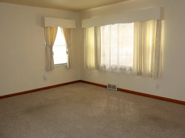 an empty room with a window