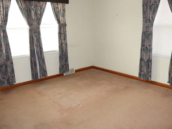 an empty room with a window