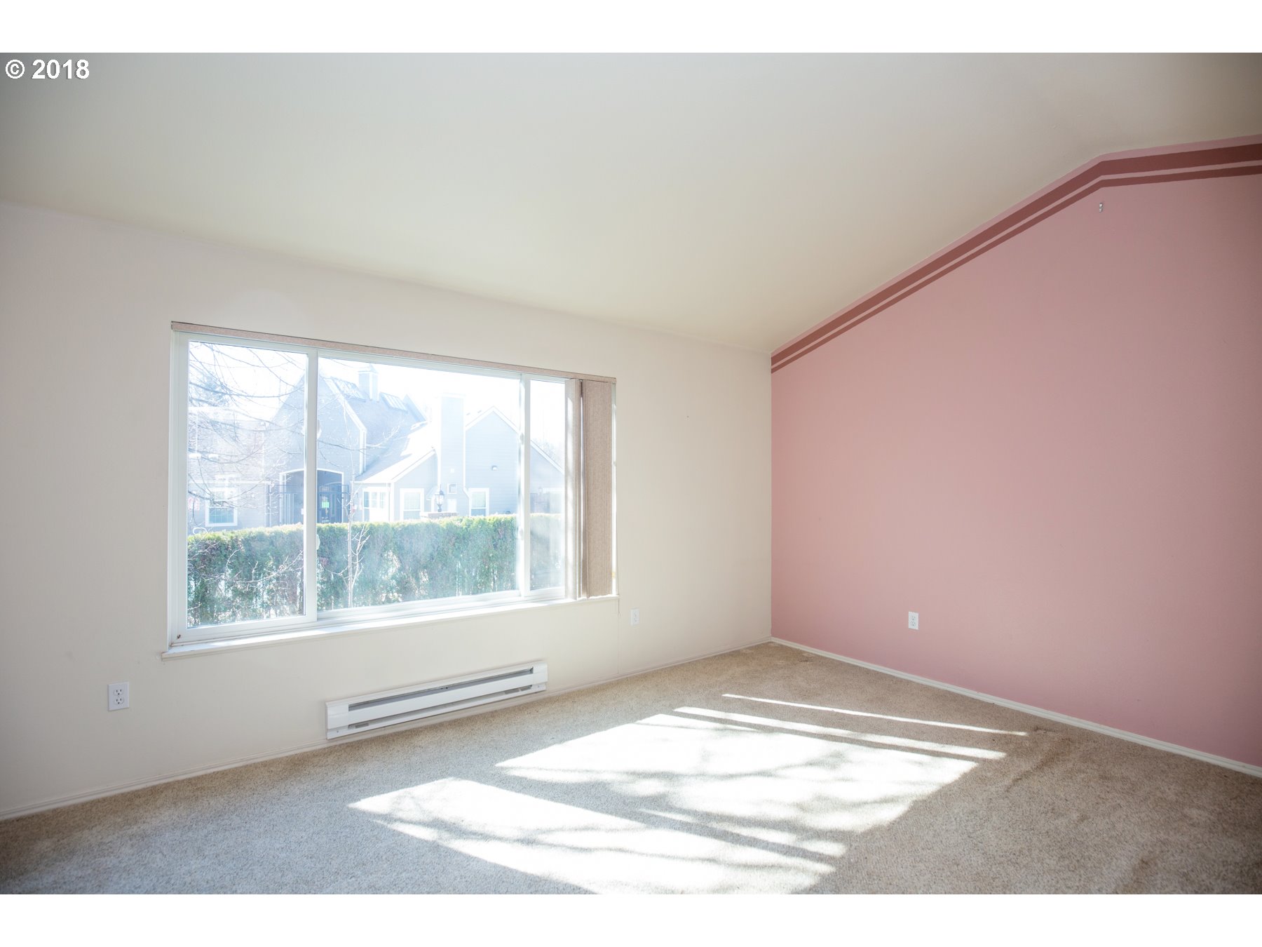 7123 Southwest Sagert Street, Unit 101 Tualatin, OR 97062 - Photo 8 of 24 a view of empty room with front door