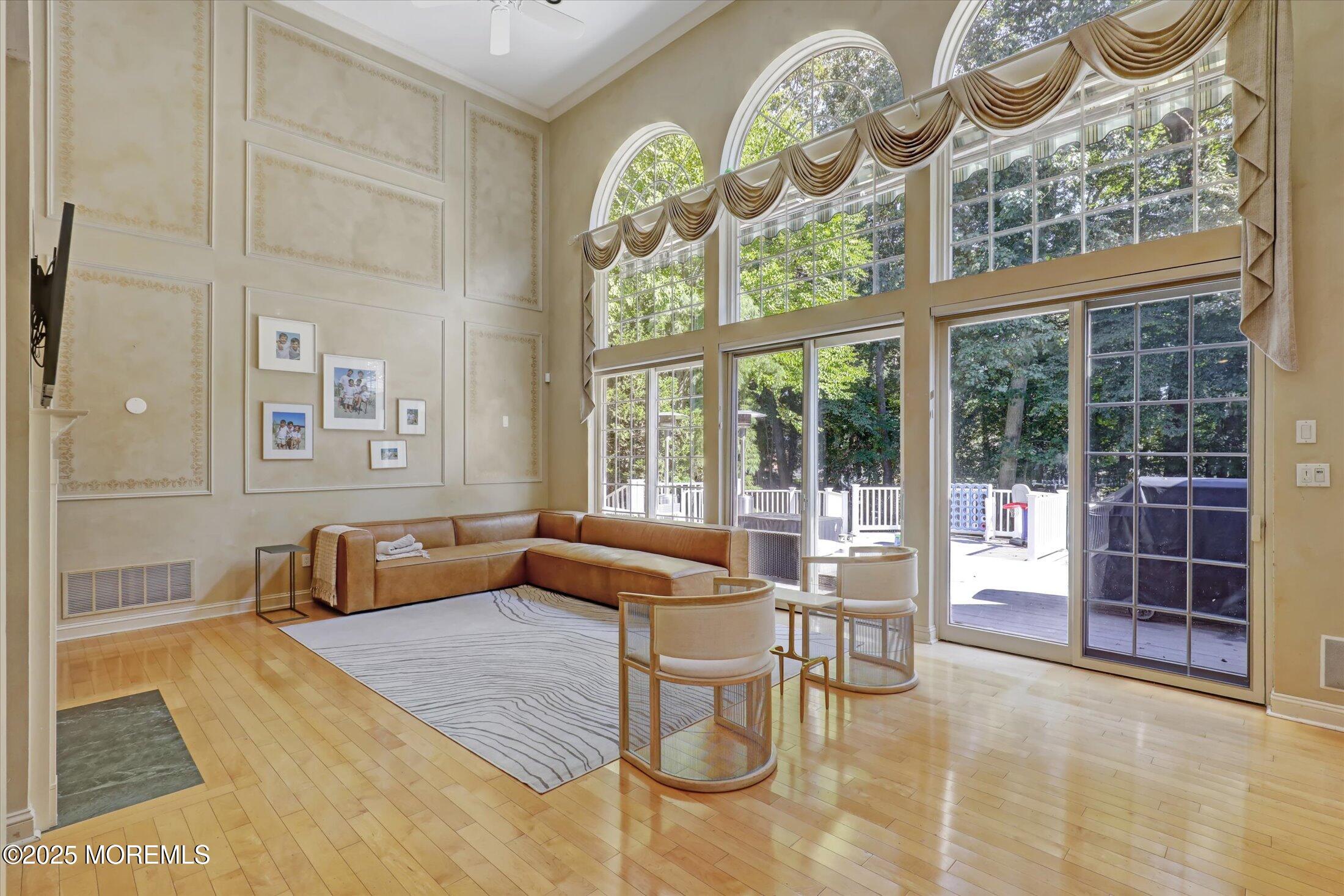 26 Bruns Road West Allenhurst, NJ 07711 - Photo 12 of 66 a living room with large windows