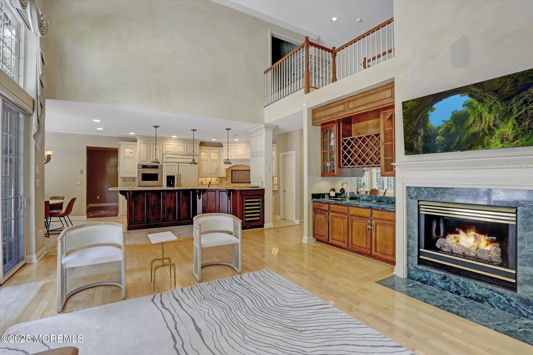 26 Bruns Road West Allenhurst, NJ 07711 - Photo 14 of 66 a living room with furniture and a fireplace