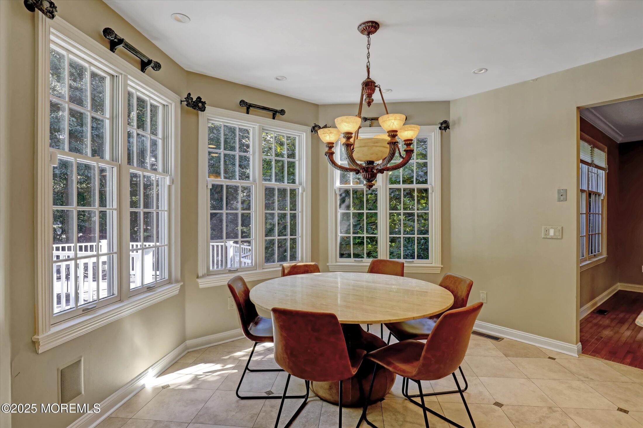 26 Bruns Road West Allenhurst, NJ 07711 - Photo 20 of 66 a view of a dining room with furniture window and outside view