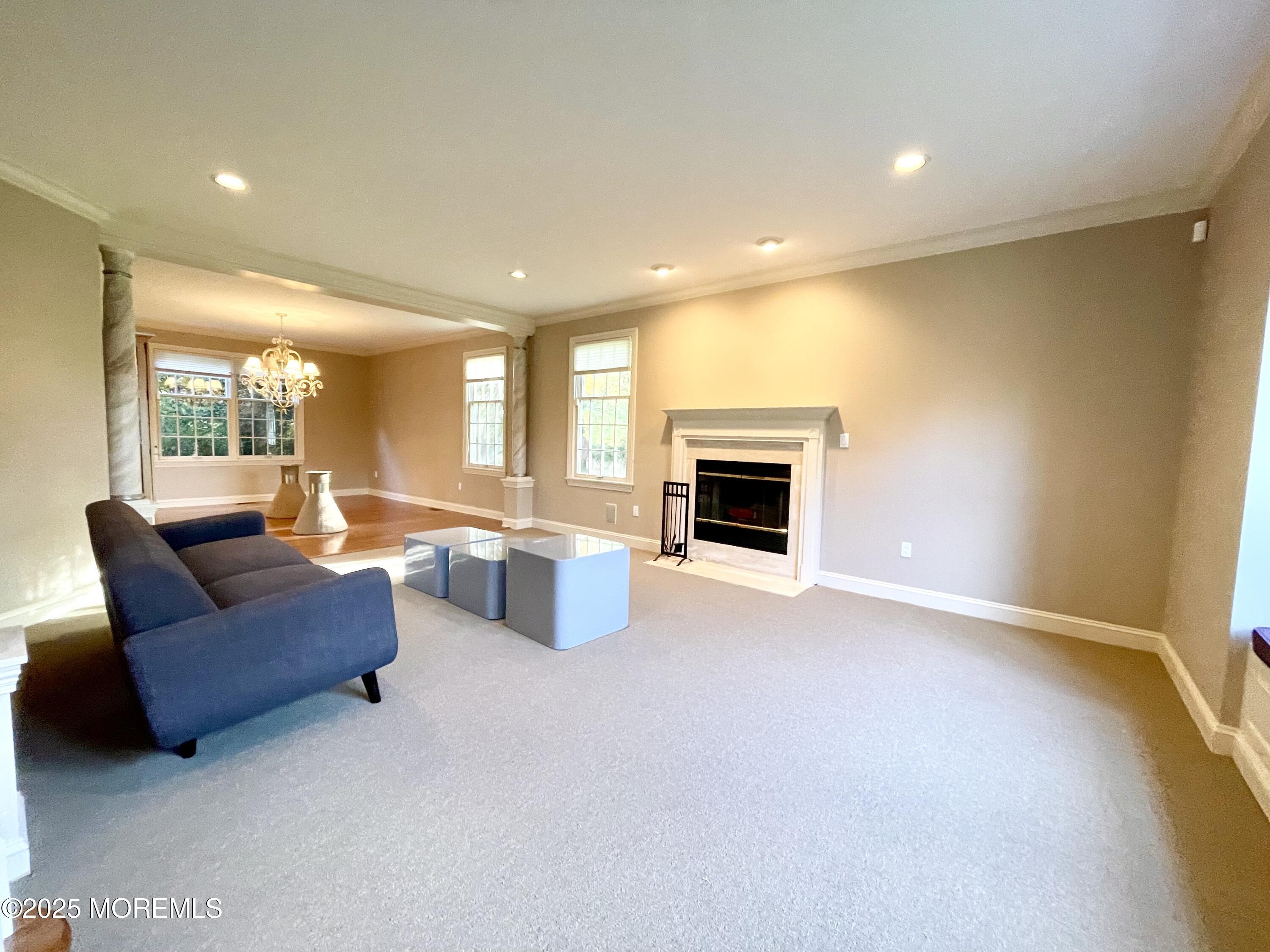 26 Bruns Road West Allenhurst, NJ 07711 - Photo 21 of 66 a living room with furniture and a fireplace