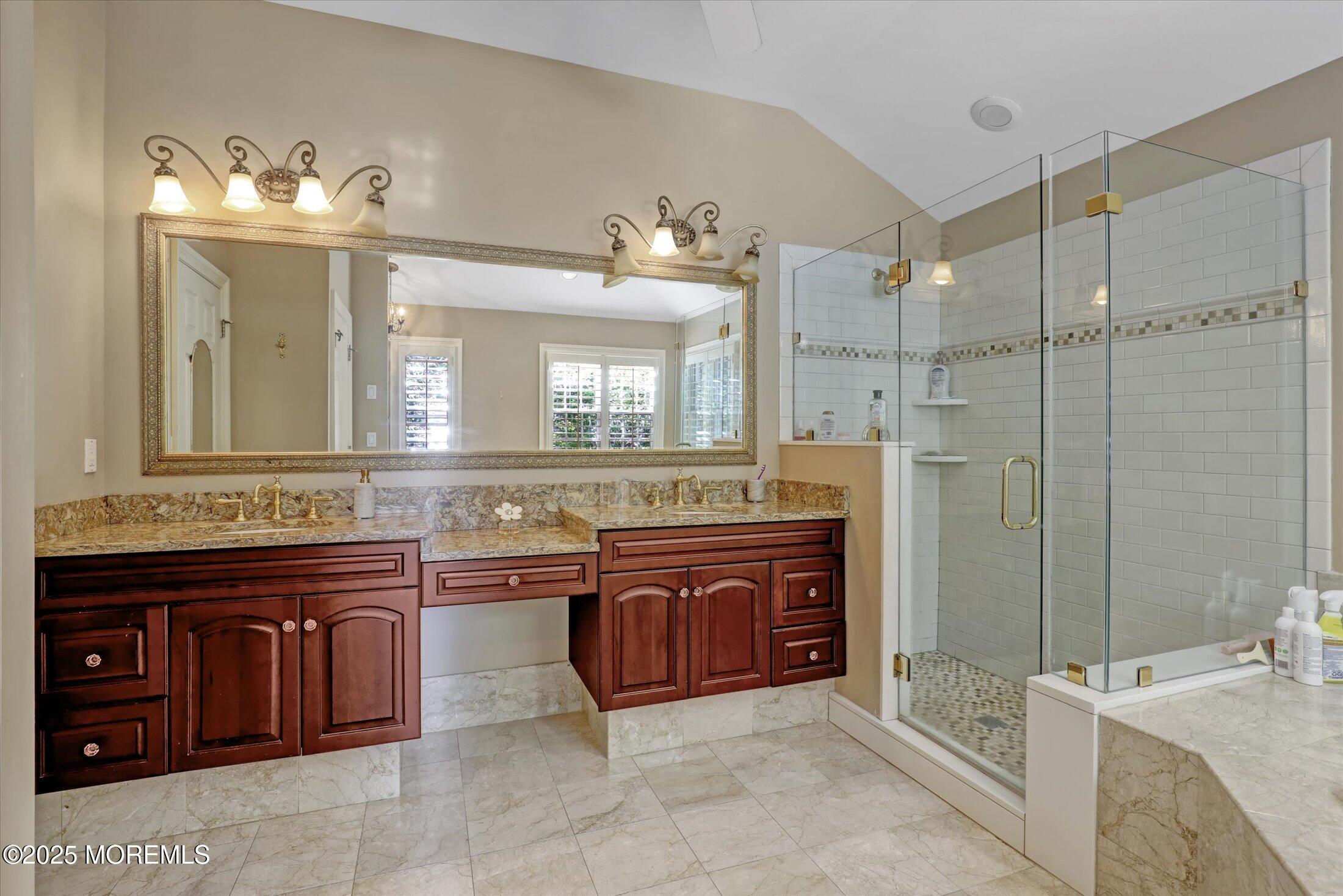 26 Bruns Road West Allenhurst, NJ 07711 - Photo 36 of 66 a spacious bathroom with a granite countertop sink and a mirror