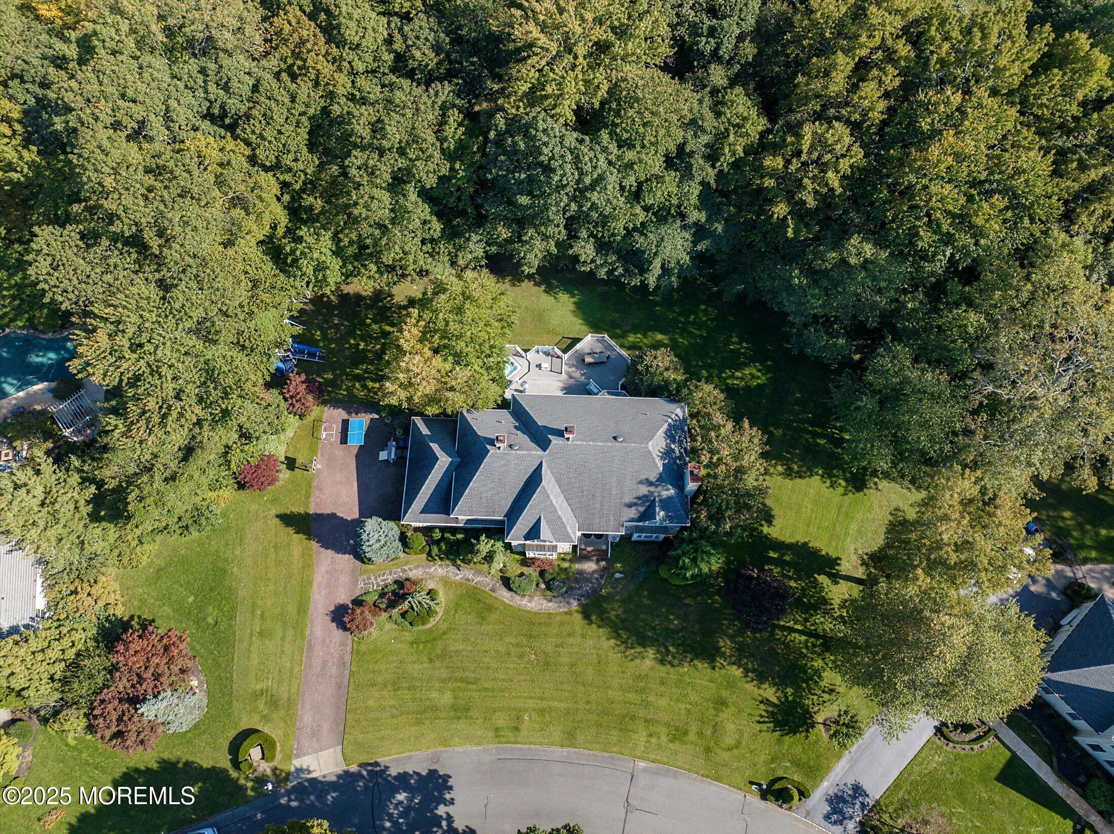 26 Bruns Road West Allenhurst, NJ 07711 - Photo 63 of 66 an aerial view of a house with a yard basket ball court and outdoor seating