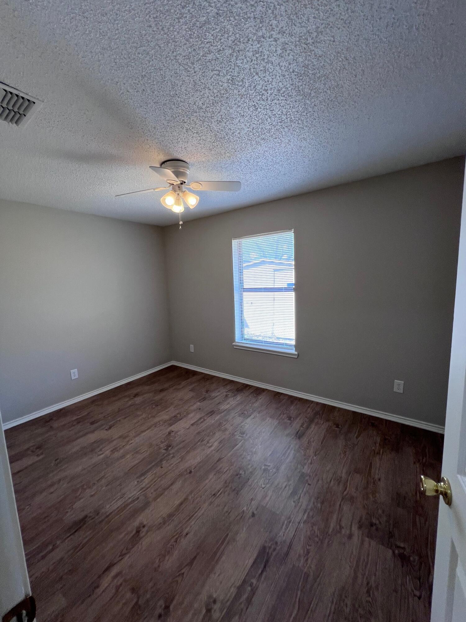 9614 Chicago Avenue Lubbock, TX 79424 - Photo 10 of 13 Bedroom 3