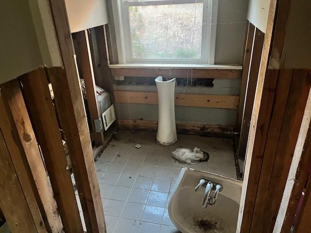 3833 Leander Court Tucker, GA 30084 - Photo 19 of 29 a bathroom with a sink and a mirror