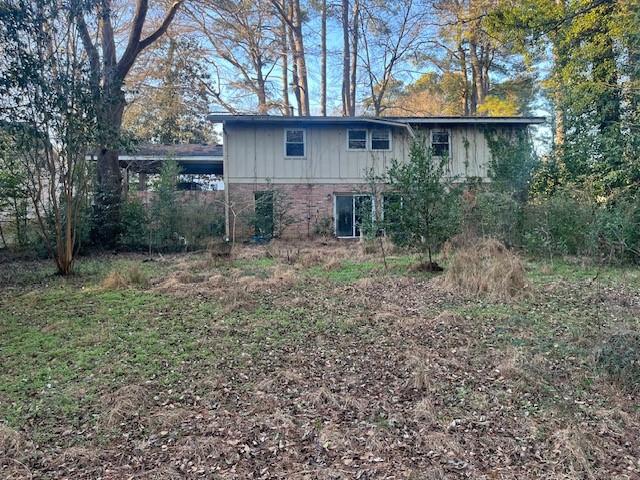 3833 Leander Court Tucker, GA 30084 - Photo 26 of 29 a view of a house with a yard and tree